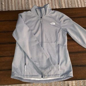 gray North Face thermal jacket
